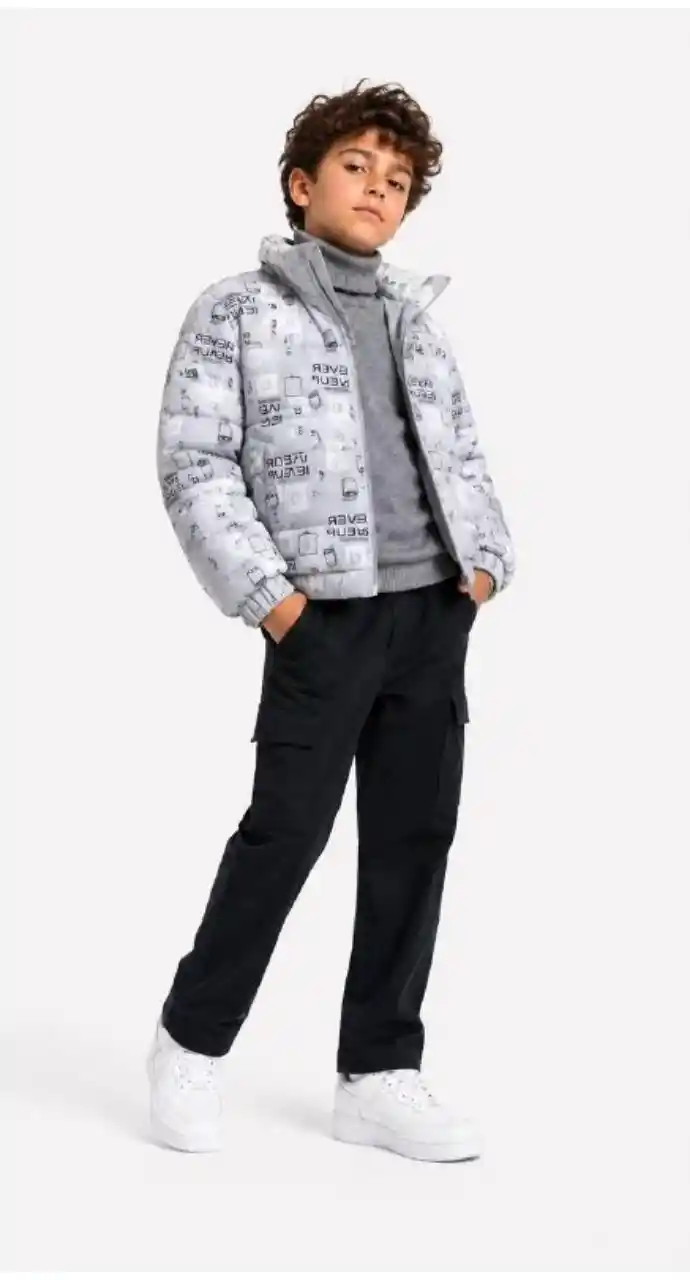 Boys' all-over print jacket with a high collar.